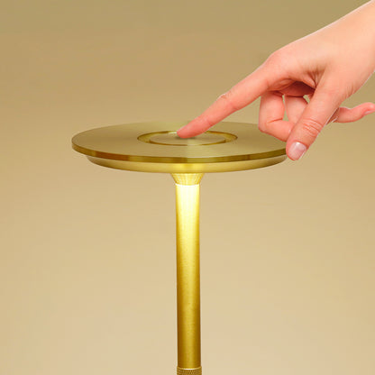Sleek gold-finish cordless LED table lamp offering versatile and contemporary lighting solution