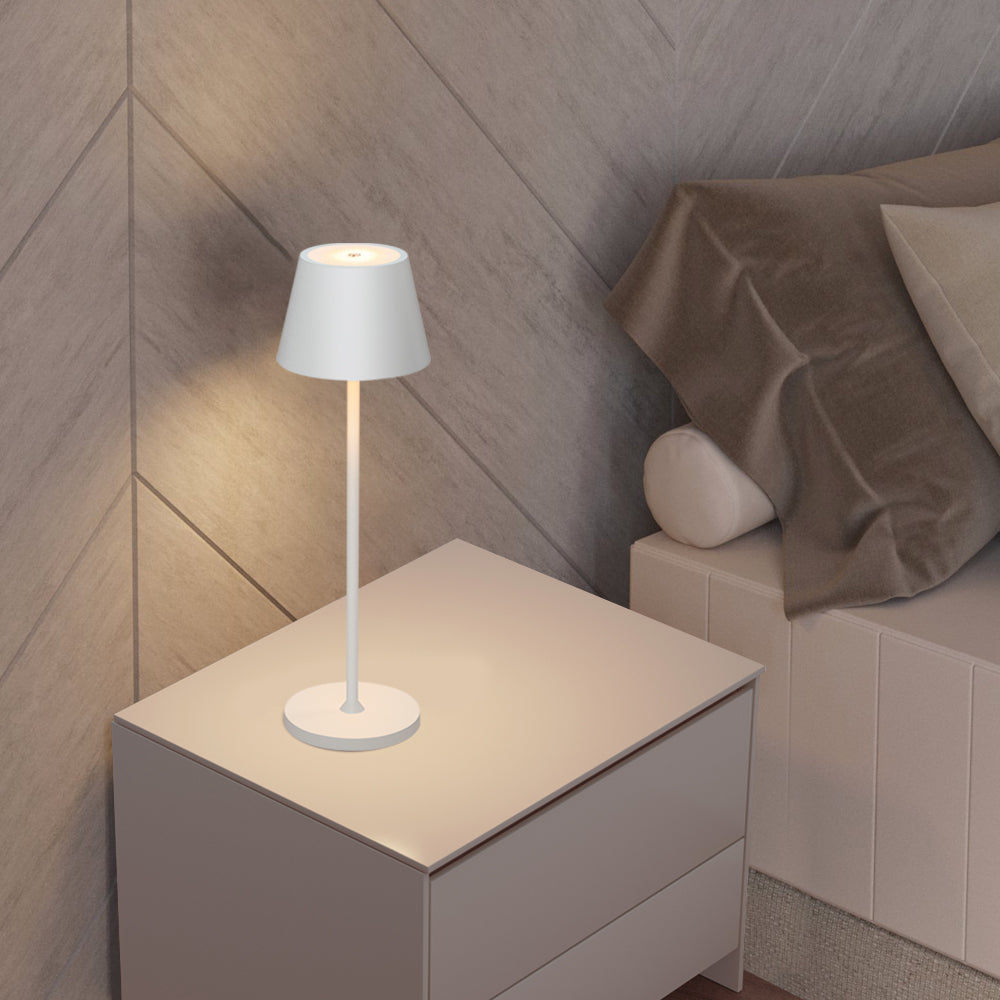 Compact and versatile LED portable lamp offering convenient cordless illumination