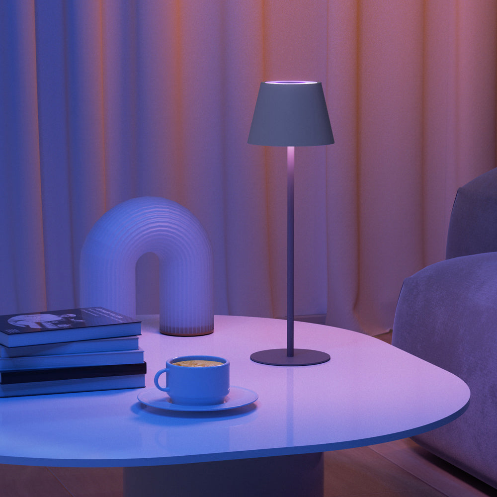 Compact portable LED lamp with multiple color modes for creative and adaptive illumination